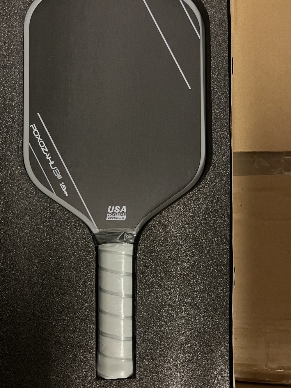Black USA Approved Pickleball Paddle with Light Gray Grip